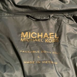 Designer green jewel tone down jacket. Gold zipper and pockets.